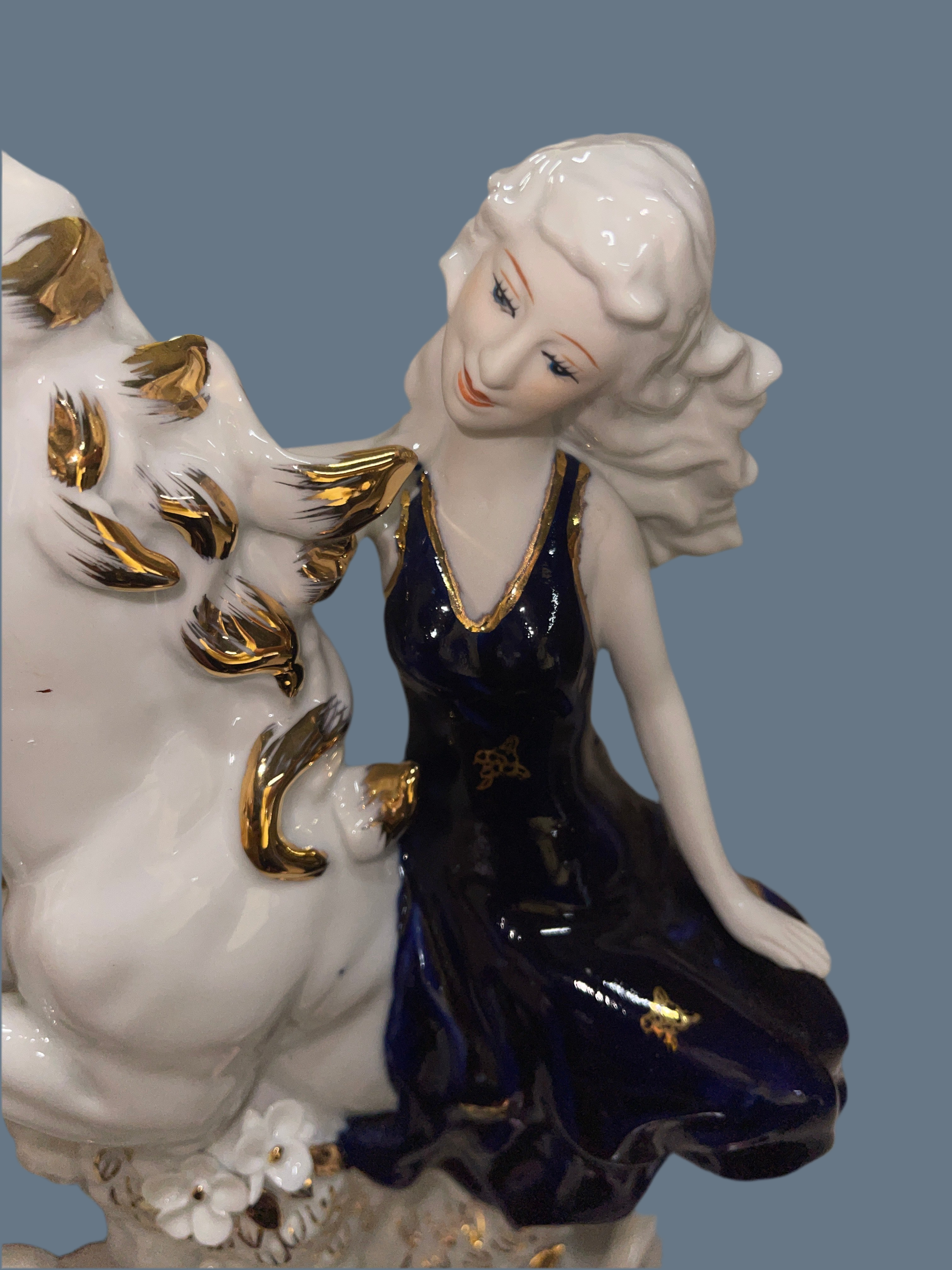 Lady in Blue Ceramic Riding Horse