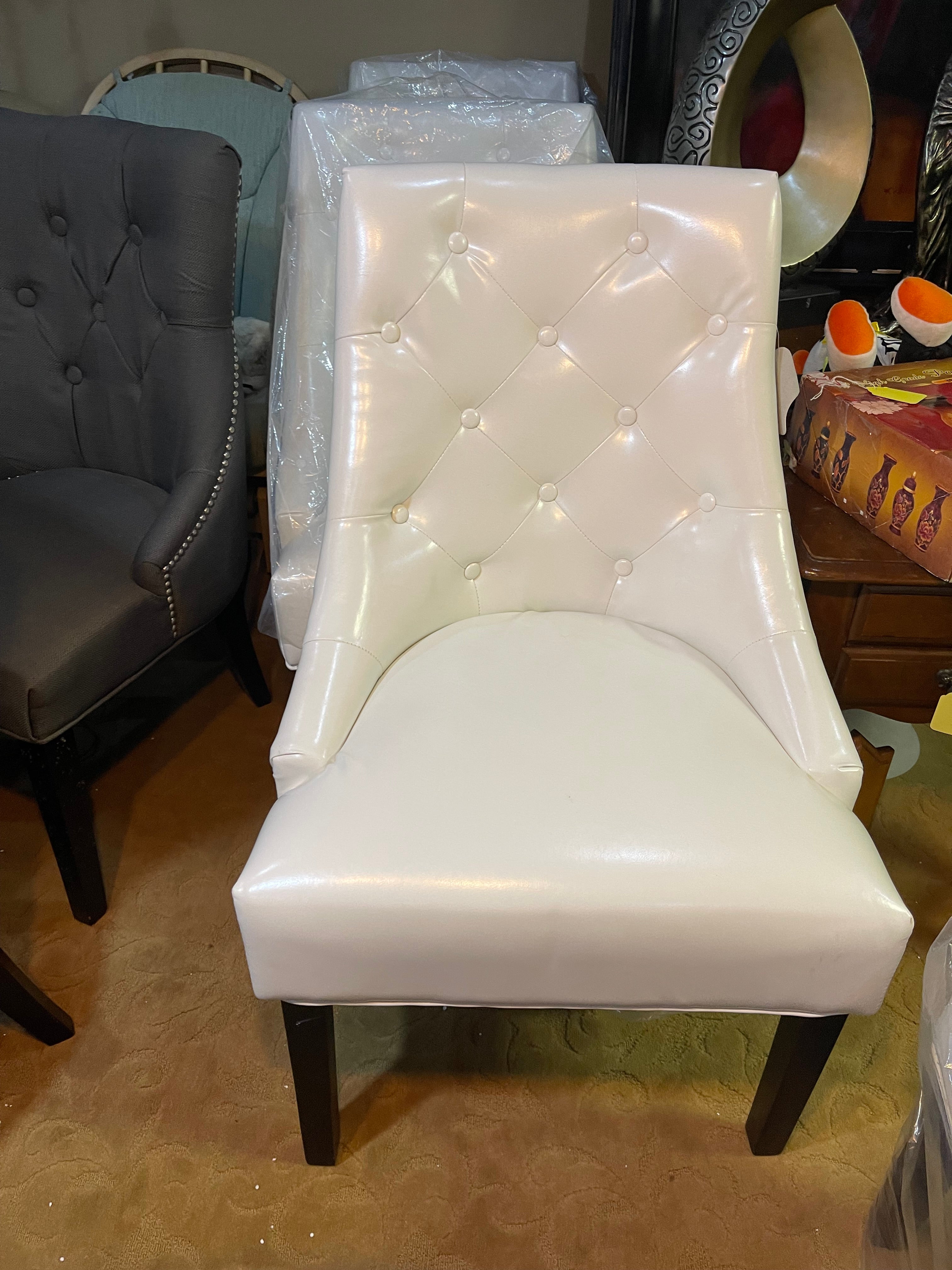 White leather Baney chair, set up four