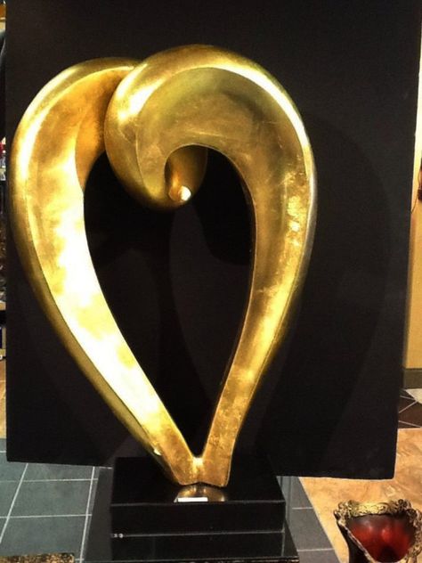 large golden heart sculpture