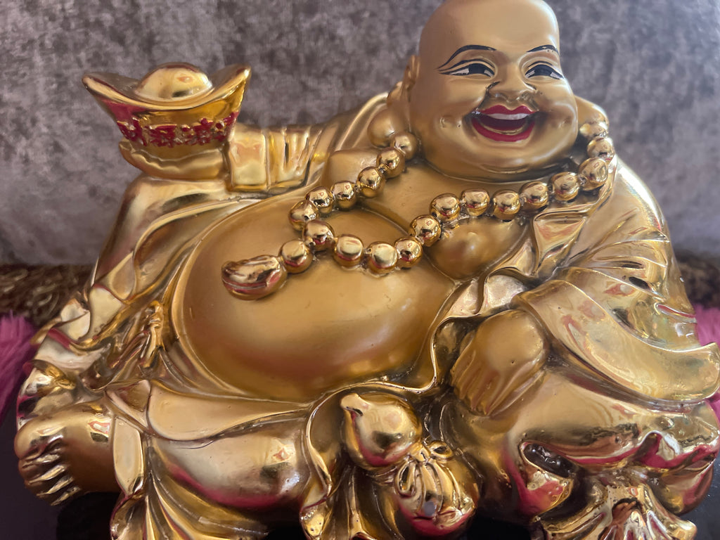 Golden laughing Buddha