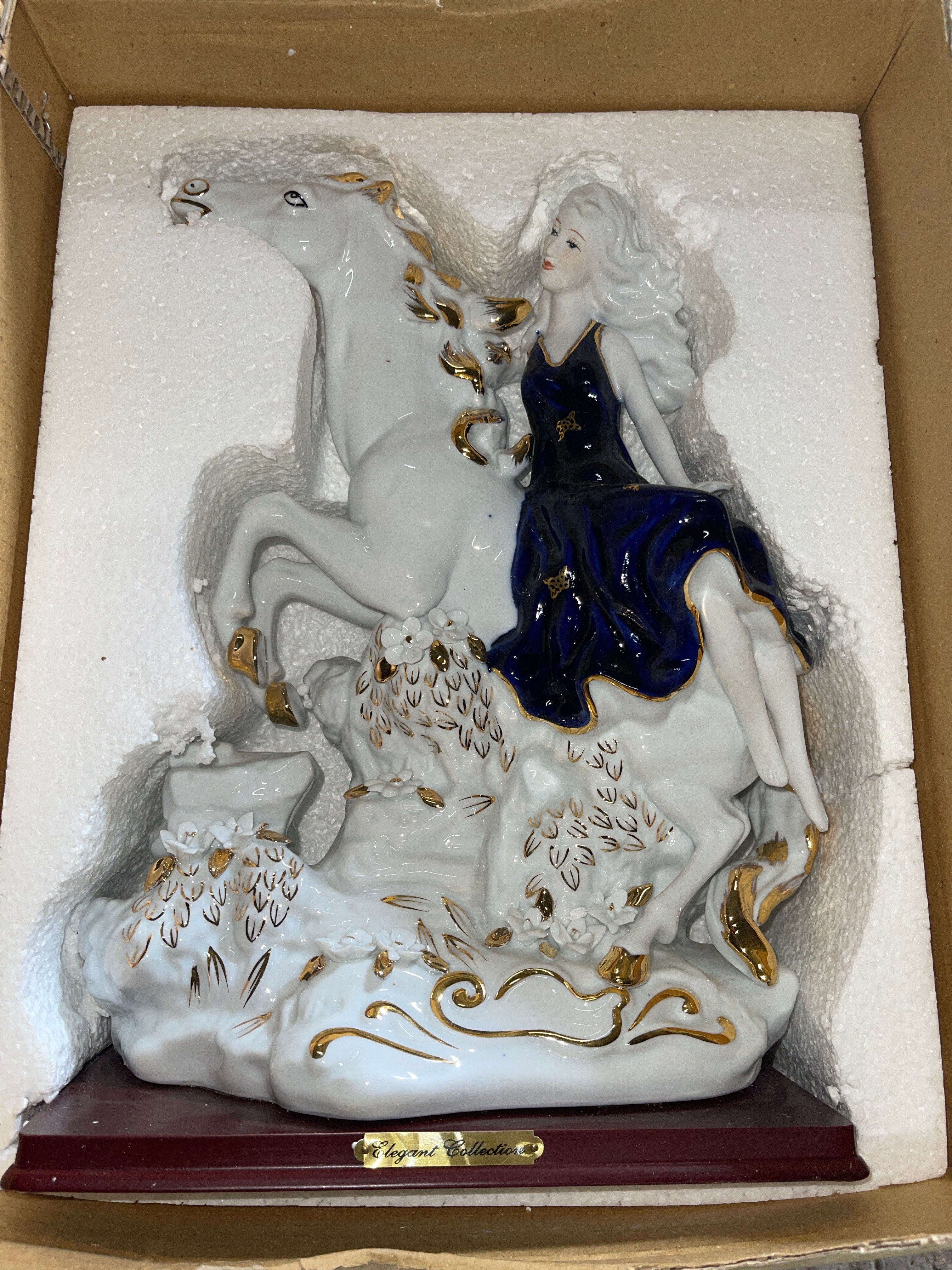 Lady in Blue Ceramic Riding Horse