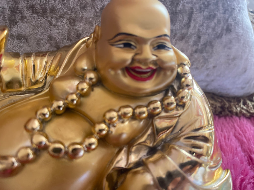 Golden laughing Buddha