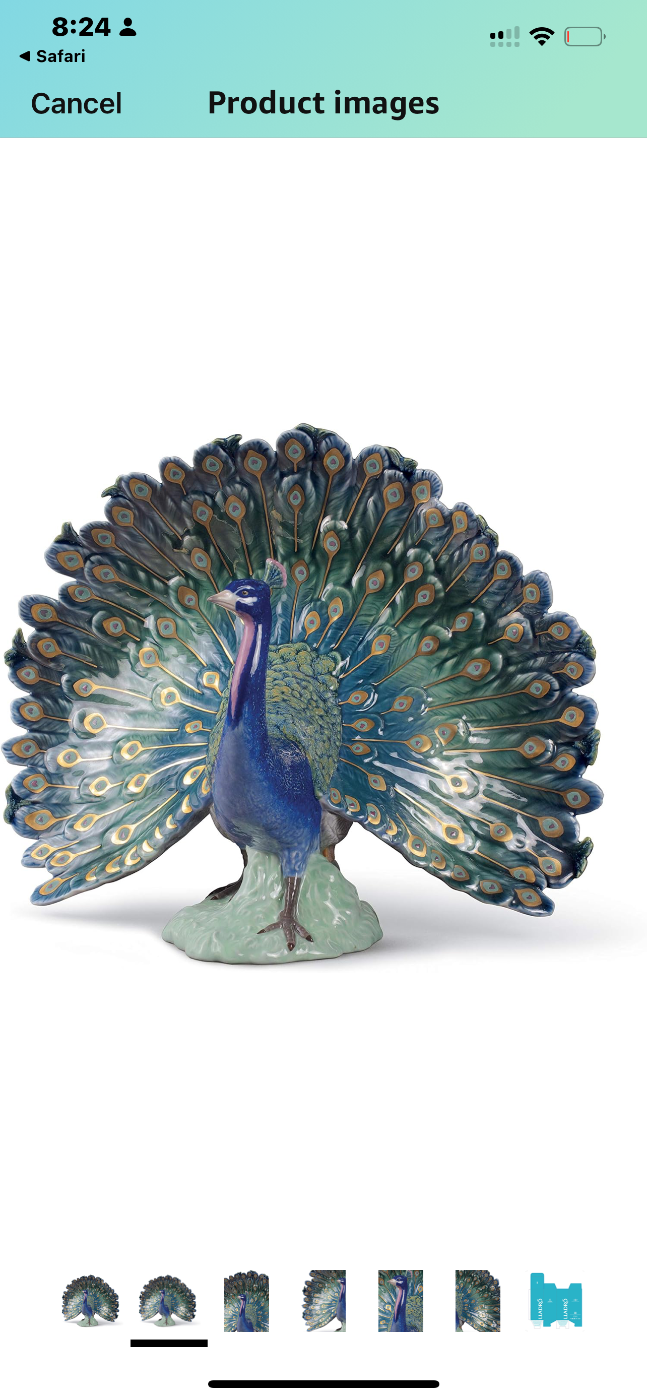 Lladro Peacock figurine