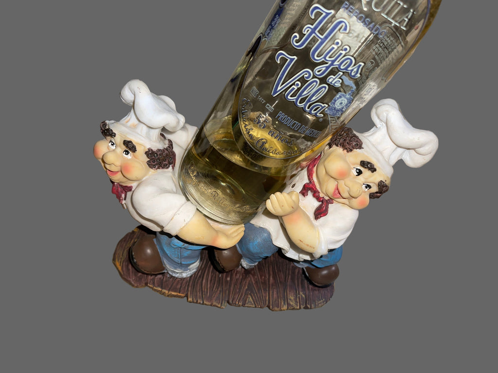 Blue Chef Vine Bottle Holder Decorative figurines on a striped surface